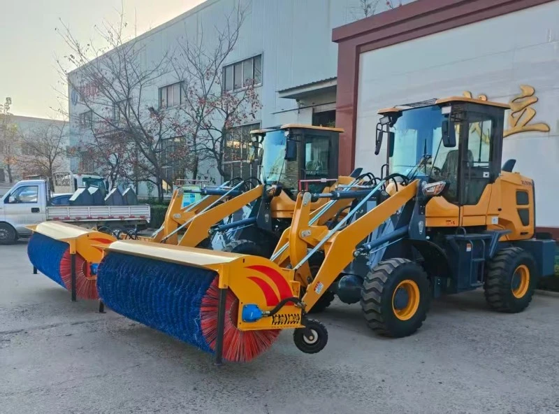 Loader Mounted Snow Sweeper working