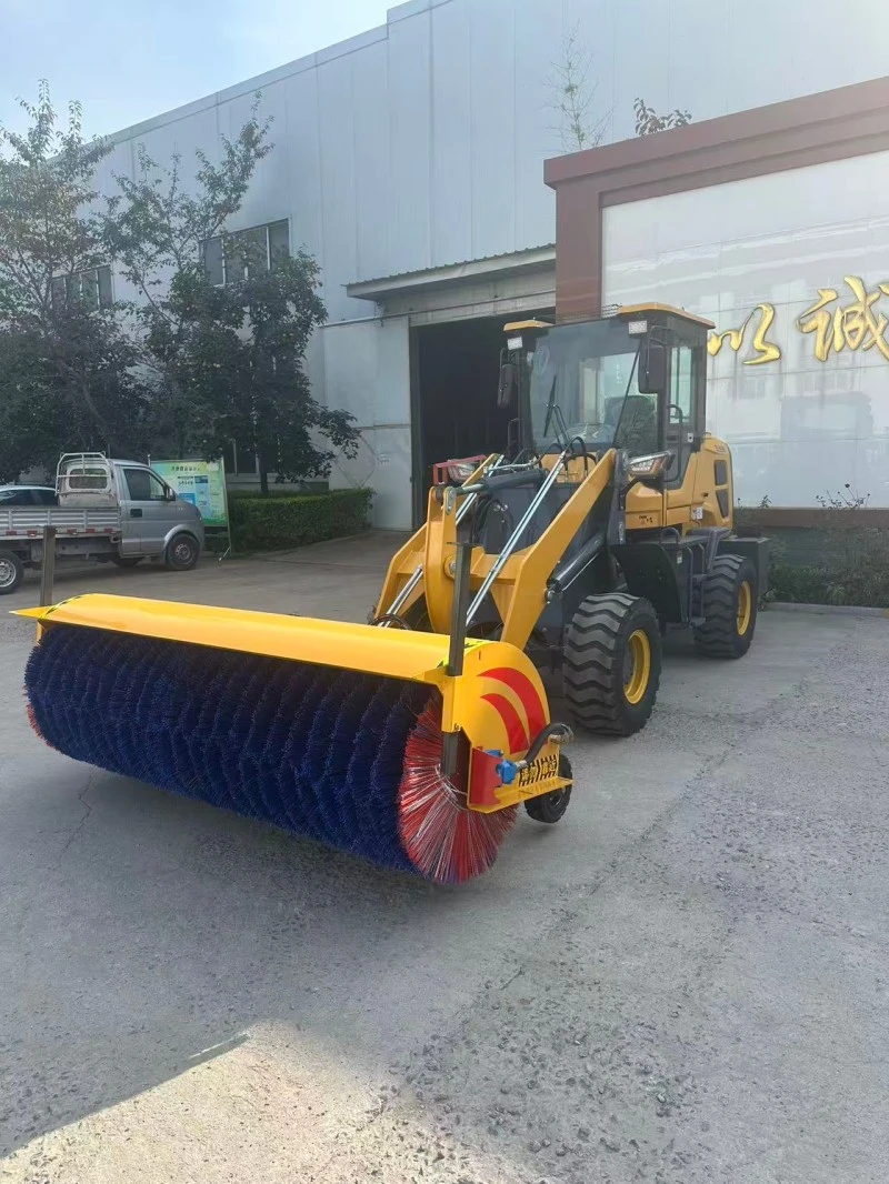 Loader Mounted Snow Sweeper clearing road